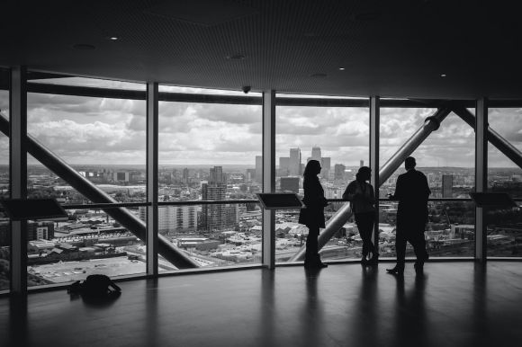 Business People - people standing inside city building