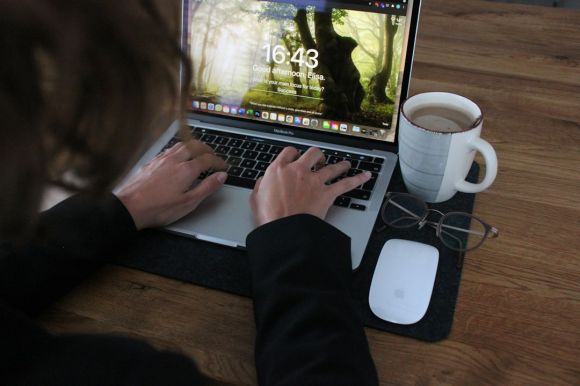 Entrepreneurship - person using macbook pro on brown wooden table